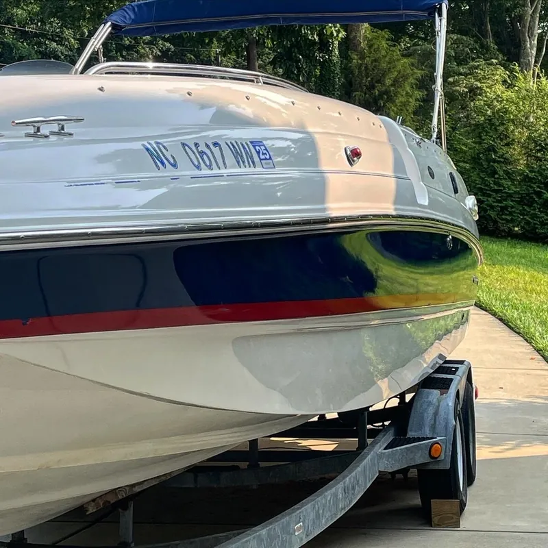 Bowrider hull on its trailer after a marine detail